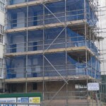 blue netting on scaffolding in Somerset