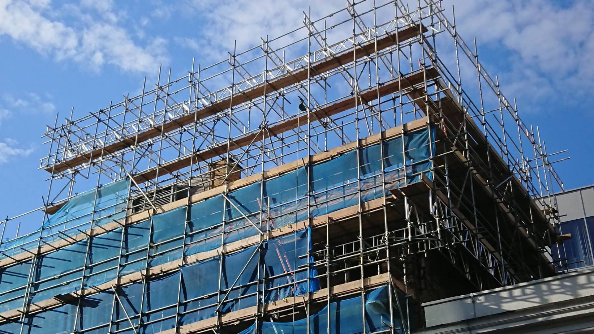 scaffolding with blue netting